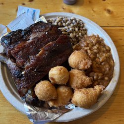 Okie Dokie's Smokehouse - Half a rack black-eyed peas baked beans hush puppies they look good