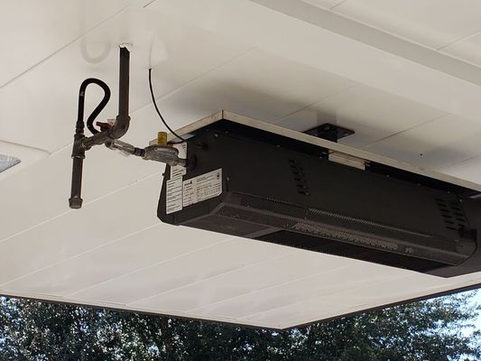 new heaters for chikfila drive thru - ran gas down rooftop of chikfila to carport for new heaters at chikfila drive thru