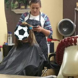 Ana's Beauty Salon - Apparently, her name is "Perla". She was TEXTING. She butchered my cousin's hair. Unacceptable.