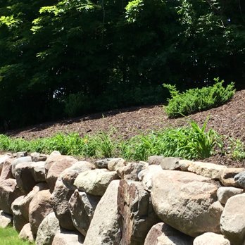 Green Lakes Landscaping - a stone retaining wall - Gardeners Near Me Green Lakes Landscaping - a stone retaining wall - Gardeners Near Me