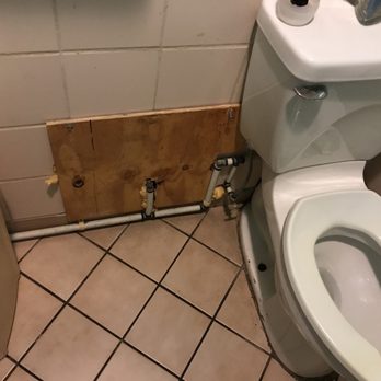 Thai Cuisine Restaurant - Restroom repairs they didn't bother to fix up and smells mildewy in there - Thai Near Me - Orlando, Florida