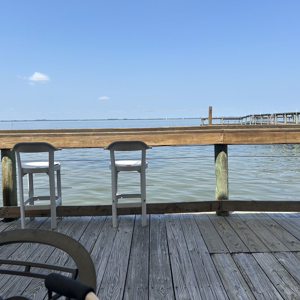Squid Lips - Waterside tables feed the fish - Seafood Near Me - Cocoa Beach, Florida Squid Lips - Waterside tables feed the fish - Seafood Near Me - Cocoa Beach, Florida