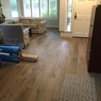 West Coast Flooring Center - a living room with hardwood floors - Flooring Near Me - Capistrano Beach, California West Coast Flooring Center - a living room with hardwood floors - Flooring Near Me - Capistrano Beach, California