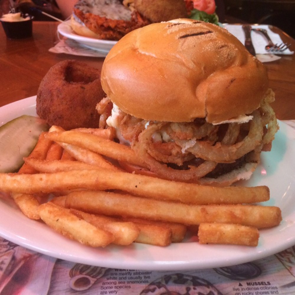 Four Winds Restaurant - The peppercorn burger with frizzled onions bacon and Swiss blue cheese added. - Seafood Near Me - Manasquan, New Jersey Four Winds Restaurant - The peppercorn burger with frizzled onions bacon and Swiss blue cheese added. - Seafood Near Me - Manasquan, New Jersey