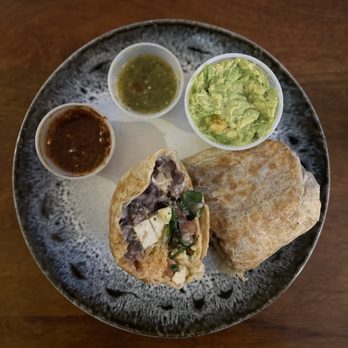 Mystic Burrito - Tofu Verde Burrito with guacamole and chip sauces - Mexican Near Me - Baltimore, Maryland Mystic Burrito - Tofu Verde Burrito with guacamole and chip sauces - Mexican Near Me - Baltimore, Maryland