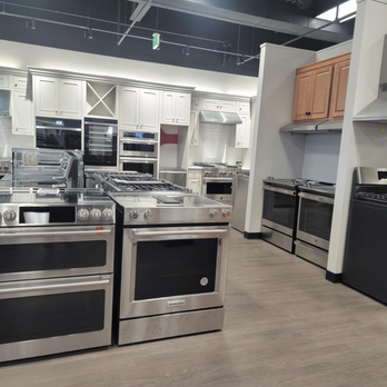 Bray & Scarff - Kitchen appliance show room with multiple stainless steel kitchen ranges and white cabinets in the back - Appliances Near Me - Sterling, Virginia Bray & Scarff - Kitchen appliance show room with multiple stainless steel kitchen ranges and white cabinets in the back - Appliances Near Me - Sterling, Virginia