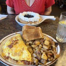Bacon and cheese omelet with home fries