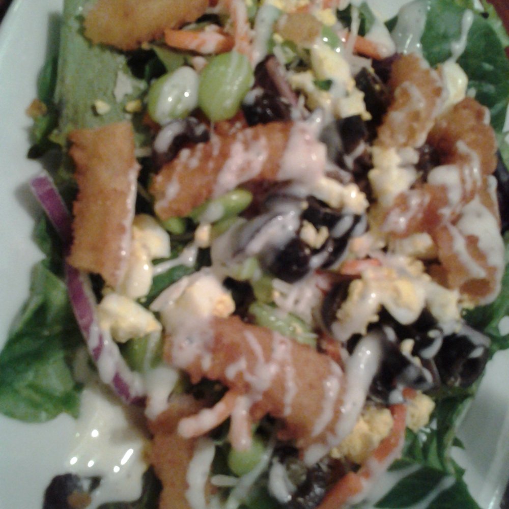 Ruby Tuesday - Salad with onion rings - American Near Me - Linthicum, Maryland Ruby Tuesday - Salad with onion rings - American Near Me - Linthicum, Maryland