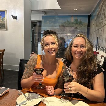 Athena Restaurant - Daughters enjoying their wine - Greek Near Me - St. Augustine, Florida