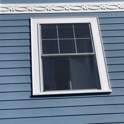 Tucker Custom Siding & Window - Everlast Composite Siding in Harbor Blue 7" Reveal