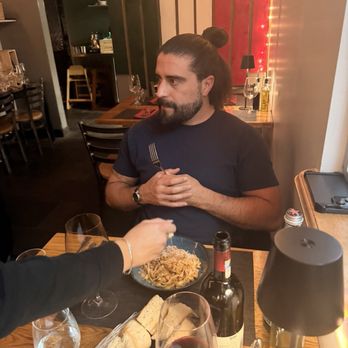 Lo Stella Ristorante - Getting that Parmesan drenched on his pasta. I believe this was the beef Ragu. - Italian Near Me - Denver, Colorado Lo Stella Ristorante - Getting that Parmesan drenched on his pasta. I believe this was the beef Ragu. - Italian Near Me - Denver, Colorado