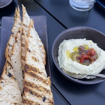 Tracey's - Pesto corn  olive spread - New American Near Me - Munising, Michigan