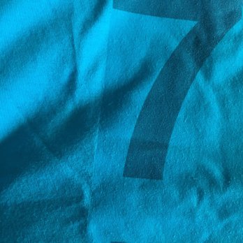 Giftique - Looks like an iron on. Very bad work. - Melbourne, Florida Giftique - Looks like an iron on. Very bad work. - Melbourne, Florida