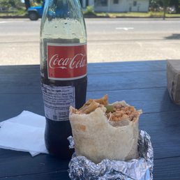 Mexican Coca-Cola and a giant fajita burrito Mexican Coca-Cola and a giant fajita burrito