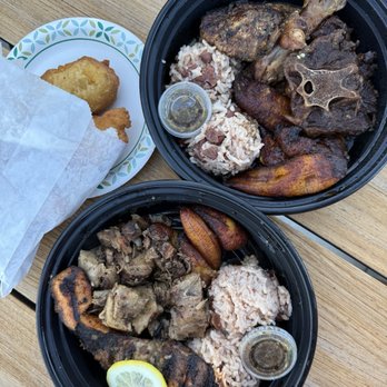 Back A Yard Caribbean Grill - Jerk Pork and Salmon Combo (bottom), Jerk Chicken and Beef Oxtails Combo (top), Corn Festivals (left) - Caribbean Near Me - Campbell, California Back A Yard Caribbean Grill - Jerk Pork and Salmon Combo (bottom), Jerk Chicken and Beef Oxtails Combo (top), Corn Festivals (left) - Caribbean Near Me - Campbell, California