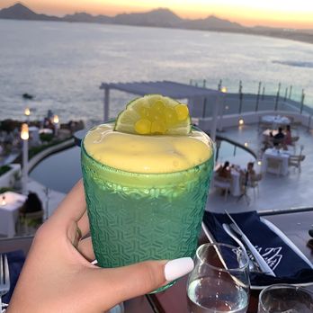 jazz on the rocks - Caribbean Jazz Project Cocktail cheers to a beautiful view and a beautiful life~ - Diners Near Me - Cabo San Lucas, BCS