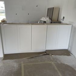 Docklife Woodworking - Pantry cabinets in the back of the kitchen peninsula. Replaced after hurricane Idalia.