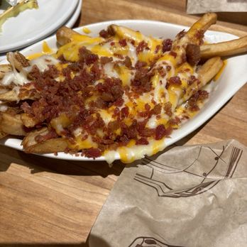Cheddar's Scratch Kitchen - Cheese & Bacon French Fries Outstanding!! I got this as an add on and it was so good and fresh. Food came out hot - Comfort Food Near Me - Erie, Pennsylvania