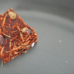 The Baklava - Pomegranate Flavor with Pistachio and Safflower. Sweet, nutty, and slightly floral.