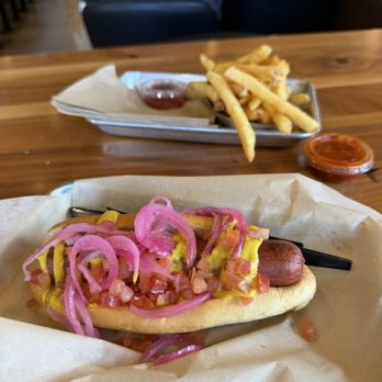 The Stand - American Classics Redefined - Hot dog with condiments in the front and french fries in the back - American Near Me - San Jose, California