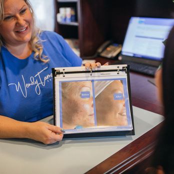 Saving Face Skinspa - Discussing Acne solutions for a client. - Acne Treatment Near Me - Olympia, Washington