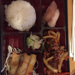 Special bento box with spicy chicken. The chicken was too oily and fatty and the sashimi didn't look right.