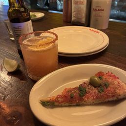 Slice of their pepperoni + olive pizza; Mangorita. Slice of their pepperoni + olive pizza; Mangorita.