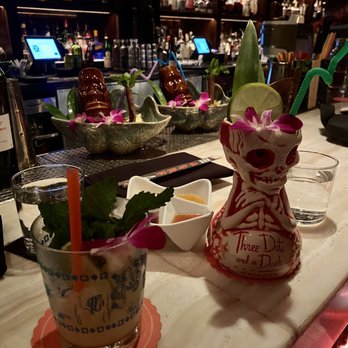 Three Dots and A Dash - Mai Tai, two Down Periscopes in the background - Asian Fusion Near Me - Chicago, Illinois Three Dots and A Dash - Mai Tai, two Down Periscopes in the background - Asian Fusion Near Me - Chicago, Illinois
