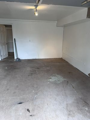 Demolition  wall in the garage and plywood on the floor and clean everything up - This was a demo  wall inside the garage and plywood was installed on the floor with flooring we have to clean everything up