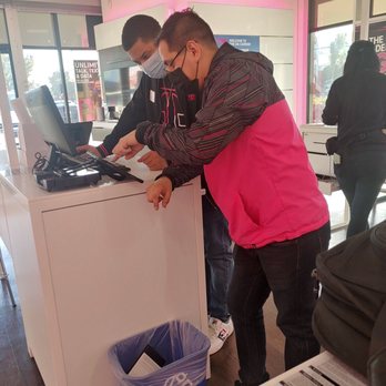 T-Mobile - Working with Andrew (in jacket) to address the switch from Sprint to T-Mobile. - Electronics Near Me - Long Beach, California T-Mobile - Working with Andrew (in jacket) to address the switch from Sprint to T-Mobile. - Electronics Near Me - Long Beach, California