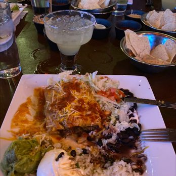 Coyote's Southwestern Grill - Cheese Poblano and the other plate is the Cheesy Chicken Encheladas. - Mexican Near Me - Greeley, Colorado Coyote's Southwestern Grill - Cheese Poblano and the other plate is the Cheesy Chicken Encheladas. - Mexican Near Me - Greeley, Colorado