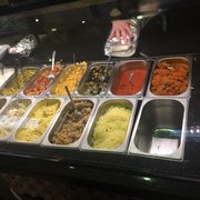 Foto zu Cafe Peri - Berlin, Deutschland. Zutaten für Kumpir(Folienkartoffeln)