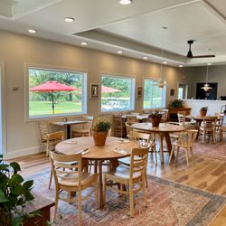 Stone Dock Golf Course & Cafe - Our lovely, updated cafe is bright and cozy with beautiful views of the course and breathtaking sunsets.