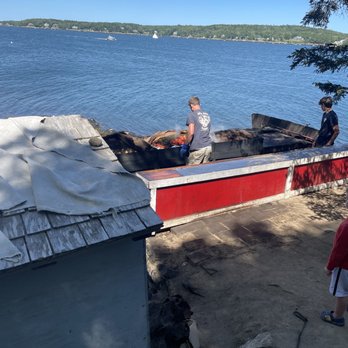 Cabbage Island Clambakes - The lobster pit where food is prepared... - Seafood Near Me - Boothbay Harbor, Maine Cabbage Island Clambakes - The lobster pit where food is prepared... - Seafood Near Me - Boothbay Harbor, Maine