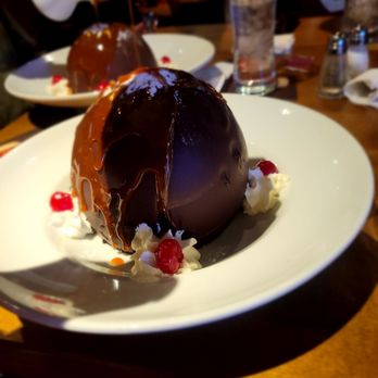 Sawmill - a chocolate dessert on a white plate - Steakhouses Near Me - Cold Lake, Alberta Sawmill - a chocolate dessert on a white plate - Steakhouses Near Me - Cold Lake, Alberta
