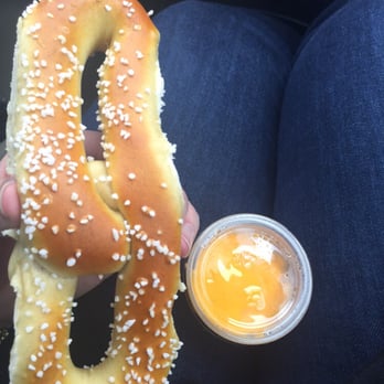 Philly Pretzel Factory - a person holding a pretzel - Bakeries Near Me - Rehoboth Beach, Delaware Philly Pretzel Factory - a person holding a pretzel - Bakeries Near Me - Rehoboth Beach, Delaware
