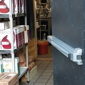 Stephano's Ristorante - A full tub of sauce on the floor with a ladle in it. - Italian Near Me - Fishkill, New York