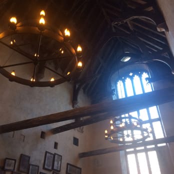 Leaky Cauldron™ - Nice high ceilings with a view of the upstairs to the right - British Near Me - Orlando, Florida