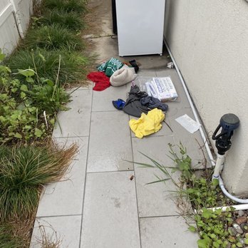 Diamond Head Inn - Homeless clothes and a bag of prescriptions at our front door - San Diego, CA