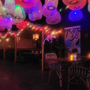 Lava & Tonic - a restaurant decorated with colorful lights - Tiki Bars Near Me - Wichita, Kansas