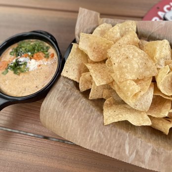 Torchy's Tacos - Queso and chips - Tex-Mex Near Me - Raleigh, North Carolina Torchy's Tacos - Queso and chips - Tex-Mex Near Me - Raleigh, North Carolina