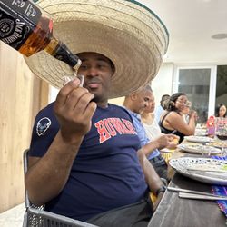 Mendieta's - Pouring liquor we bought! Outstanding!