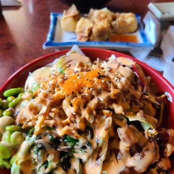 Yummi Tummi - a plate of food on a table - Sushi Bars Near Me - Saint Louis, Missouri Yummi Tummi - a plate of food on a table - Sushi Bars Near Me - Saint Louis, Missouri