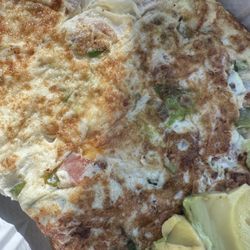 Jason Deli - Egg white omelette with turkey bacon, peppers, onions, tomatoes, jalapeño, and cheddar cheese