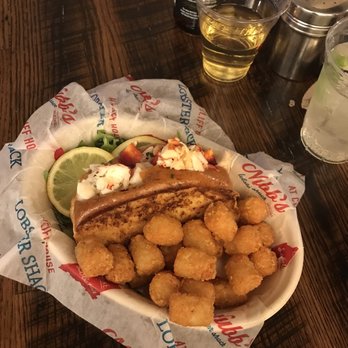Nubbs Lobster Shack - Buttered lobster roll with tots - Seafood Near Me - Cape Neddick, Maine Nubbs Lobster Shack - Buttered lobster roll with tots - Seafood Near Me - Cape Neddick, Maine