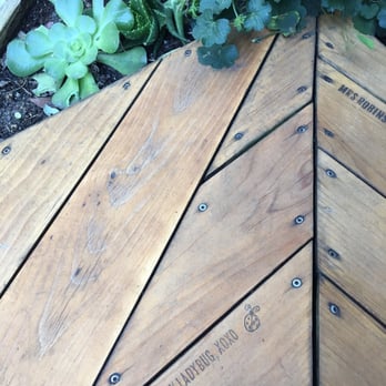 Farm : Table - Adorable love notes carved on the outside seating nooks. Outside seating nooks!!! How cool?!? - Coffee & Tea Near Me - San Francisco, California