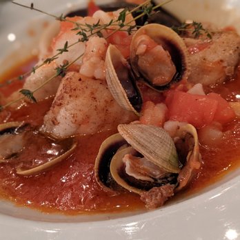 Novitá - Monkfish in seafood stew - Italian Near Me - New York, New York Novitá - Monkfish in seafood stew - Italian Near Me - New York, New York