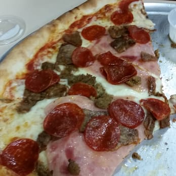 Marinara Pizza - Just 3 out of 8 huge slices of our awesome meat combo pizza! - Pizza Near Me - Plano, Texas Marinara Pizza - Just 3 out of 8 huge slices of our awesome meat combo pizza! - Pizza Near Me - Plano, Texas