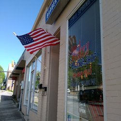 Mike's Barber Shop - Unless it is raining the flag is always out at Mike's Barber Shop!