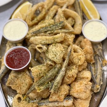Rayan - a platter of fried fish and vegetables - Seafood Markets Near Me - Saint-Léonard, Quebec Rayan - a platter of fried fish and vegetables - Seafood Markets Near Me - Saint-Léonard, Quebec